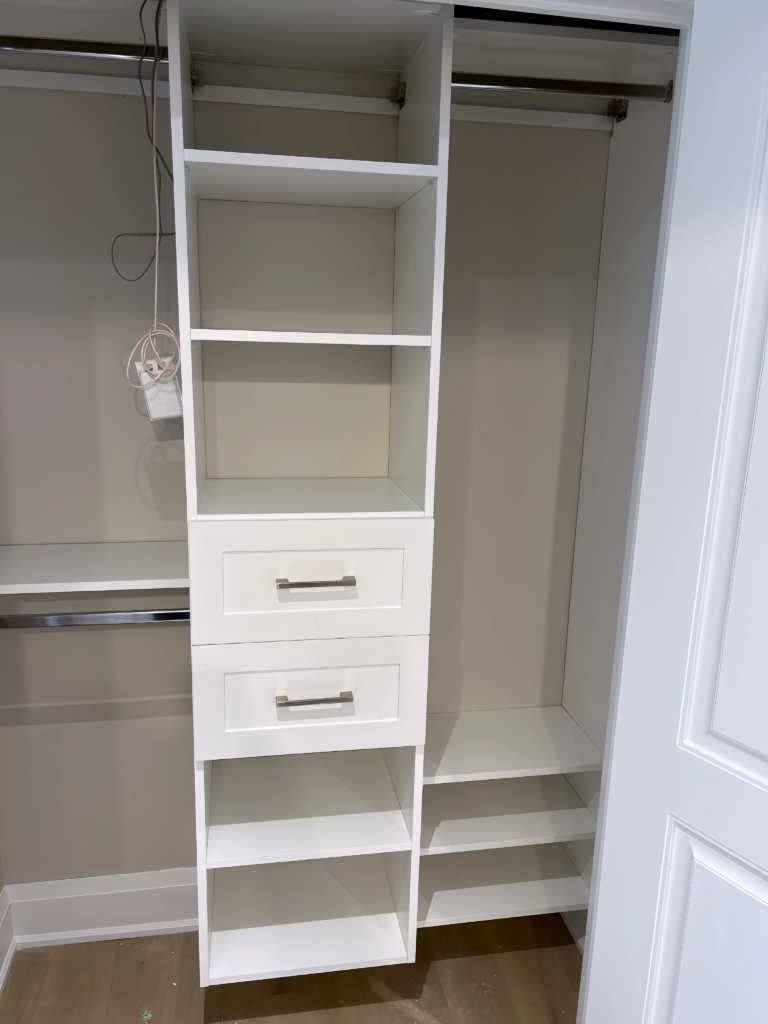 walk-in wardrobe with velvet drawer inserts