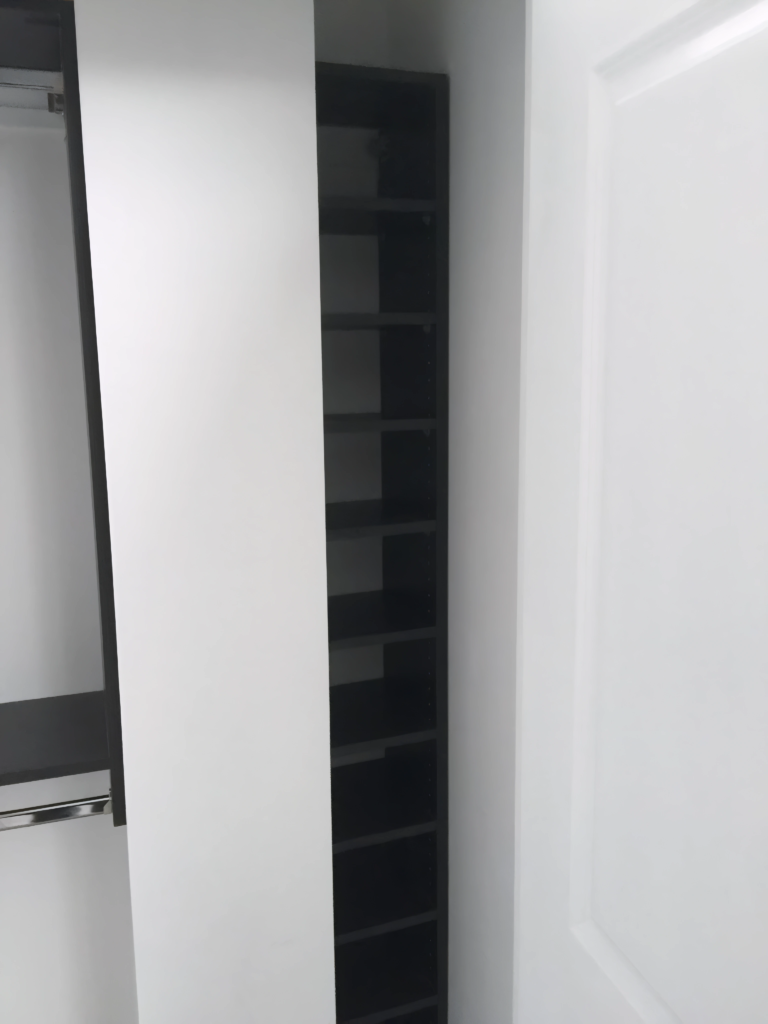 low-profile closet layout with top storage