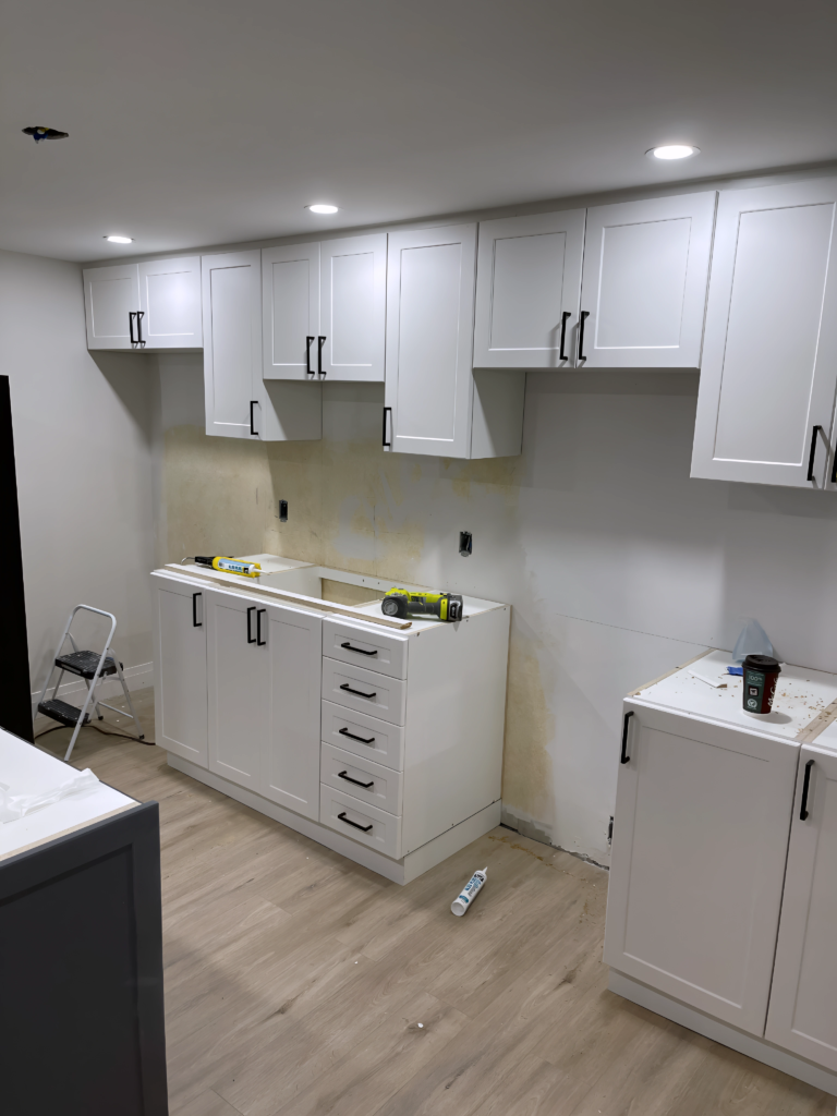 white lacquer closet with gold trim accents