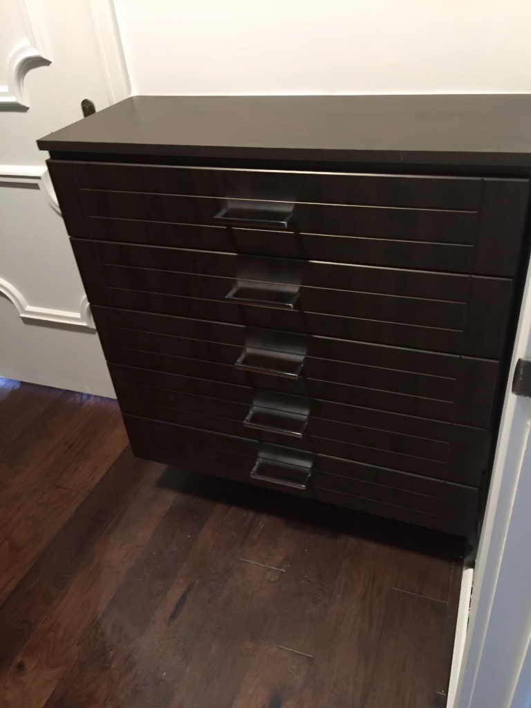 long reach-in closet with integrated hamper space