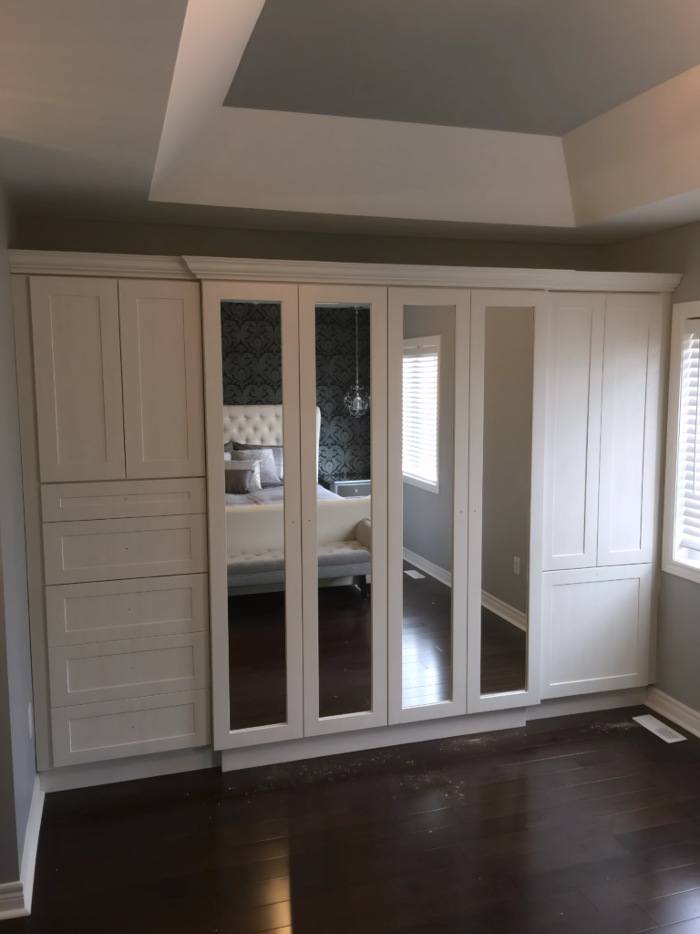 luxury walk-in closet with LED lighting in Toronto