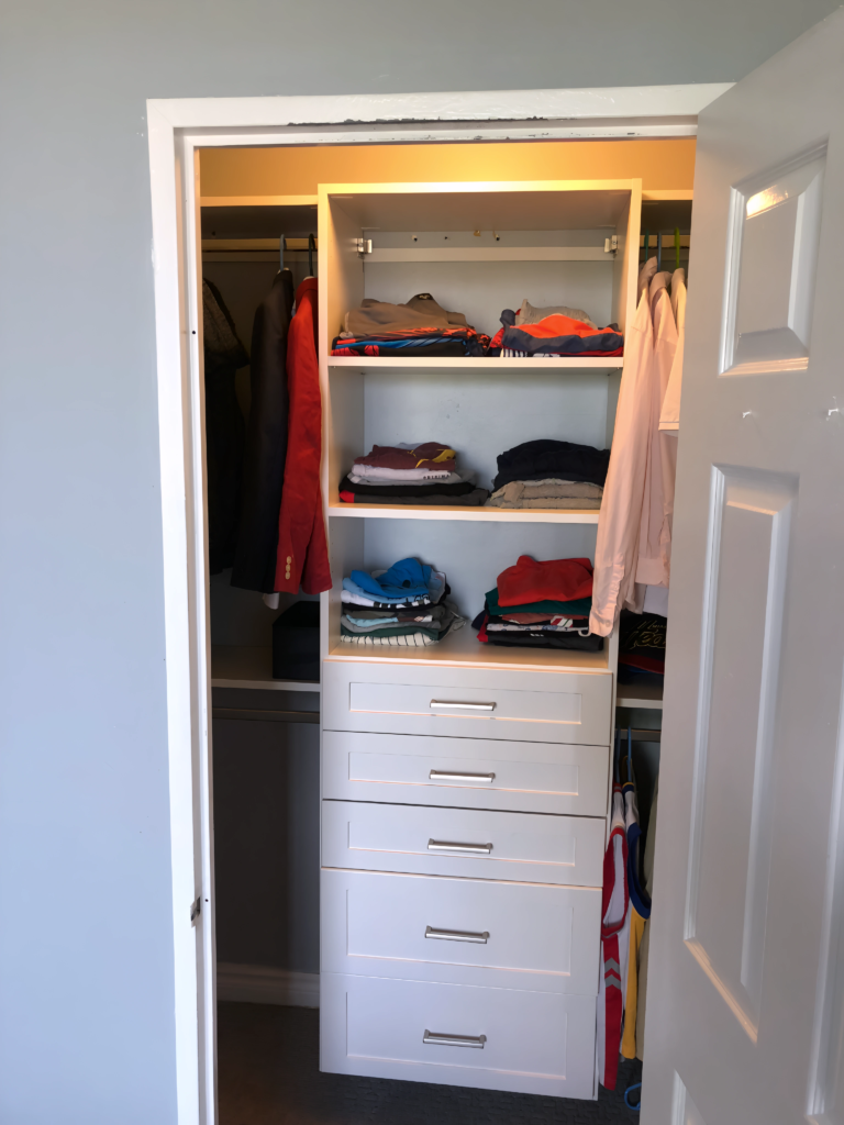 minimalist closet system with push-to-open drawers
