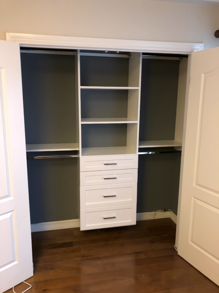 Toronto hallway closet with custom racks