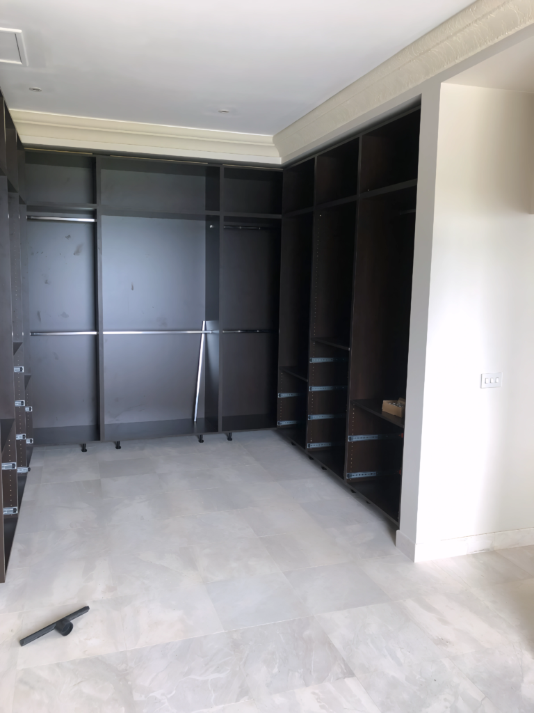angled wall closet design for sloped ceilings