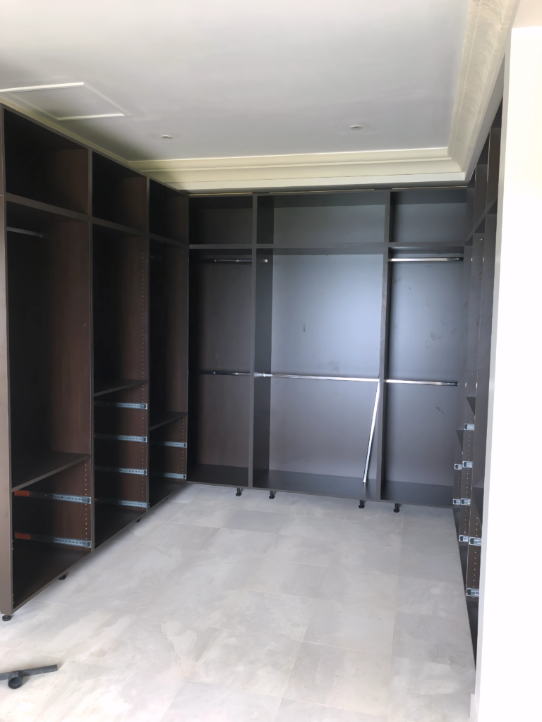 dual wardrobe closet with top storage cabinets